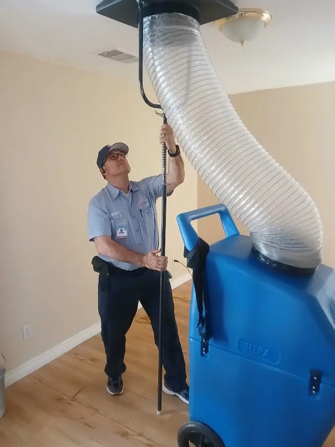 Mini Split Installation technician using HEPA equipment in Webster City